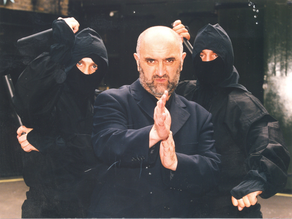 Alexei Sayle without the drunken lunches but with a scary kung fu stance