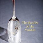 Bonfire of the Vanities cover - a wasp trapped in an upturned wine-glass